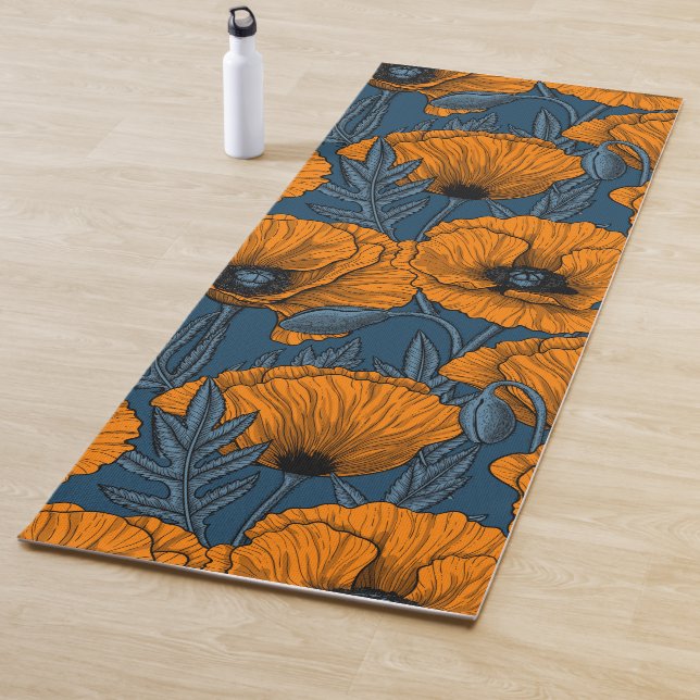 Orange poppies on dark blue yoga mat (In Situ)