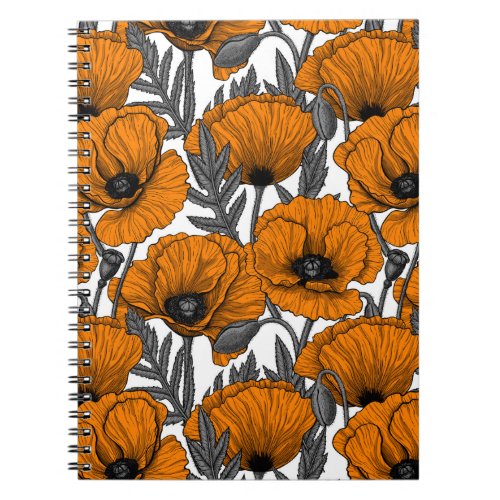 Orange poppies on white notebook