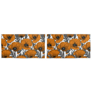 Orange poppies on white pillow case