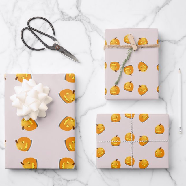 Orange pumpkin head pattern wrapping paper sheets (Front)