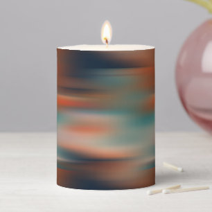 orange red and teal streaks pillar candle