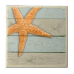 Orange Starfish Tile<br><div class="desc">An orange starfish on a pastel distressed background.</div>