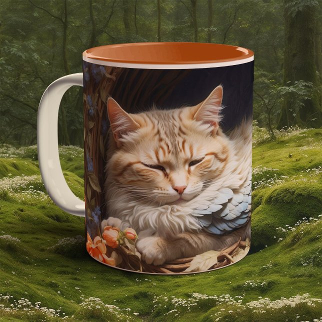 Orange Tabby Kitten in Bed of Blue Feathers Two-Tone Coffee Mug (Creator Uploaded)