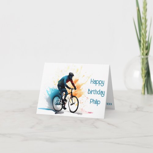 orange teal and black cyclist Birthday Card