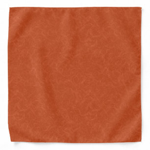 Orange textured surface with swirling pattern bandana
