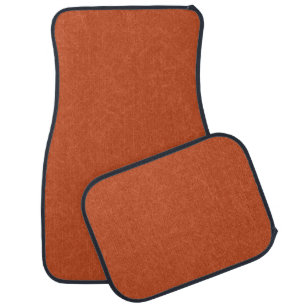 Orange textured surface with swirling pattern car floor mat