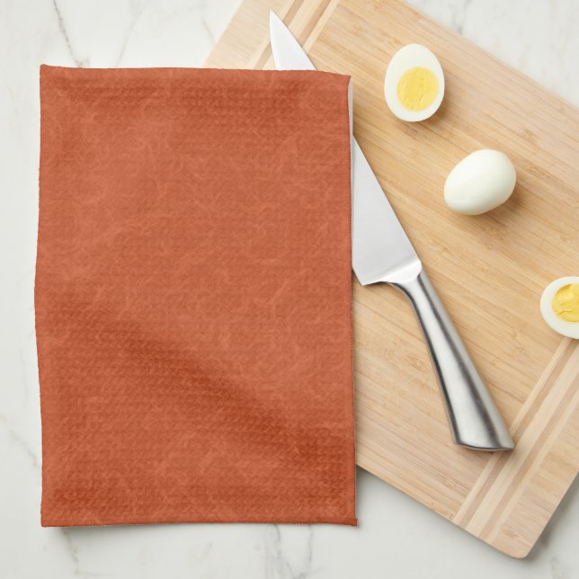 Orange textured surface with swirling pattern kitchen towel (Quarter Fold)