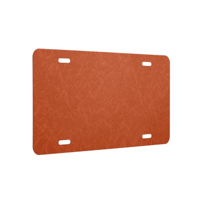 Orange textured surface with swirling pattern license plate (Right)