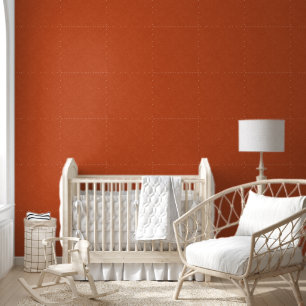 Orange textured surface with swirling pattern wallpaper