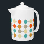 Orange Turquoise Cream Circles Retro Pattern Teapot<br><div class="desc">This colorful mid century modern tea pot features turquoise blue,  two shades of orange,  cream,  and tan circles on a black lined grid. Add that bit of fun to your tea time!</div>