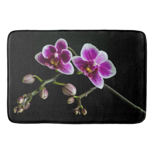 Orchid pink white color on black pale gentle  bath mat