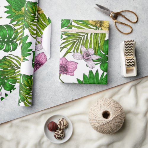 Orchids and palm leaves pink yellow green and w wrapping paper