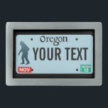 Oregon Sasquatch License Plate Rectangular Belt Buckle<br><div class="desc">The dark silhouette of Sasquatch (Bigfoot) on a blank Oregon license plate. Add your own text. Contact me for special requests. License plates for additional states and other entities (Canadian provinces, foreign countries) upon request. If you live or travel in rural areas of the Pacific Northwest you may possibly come...</div>