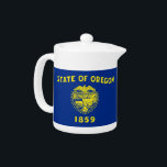 Oregon State Flag Teapot<br><div class="desc">Brew up a cup of state pride with our charming teapot featuring the flag of Oregon! This unique teapot is more than just a functional kitchen item; it's a celebration of Oregon's rich heritage and cultural identity. Adorned with a high-quality print of the Oregon state flag, this teapot brings a...</div>
