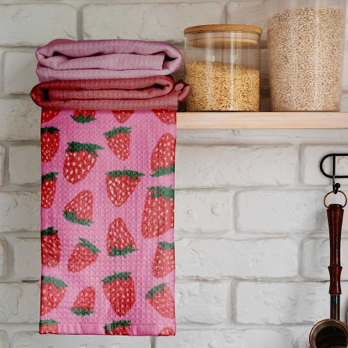 Organic summer strawberries red on pink background kitchen towel