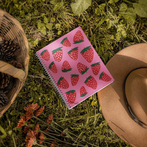 Organic summer strawberries red on pink background notebook