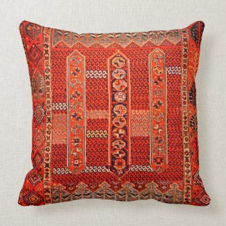Oriental rug design in  bright oranges  throw pillow
