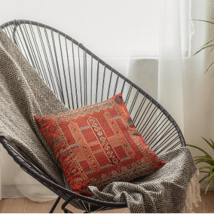 Oriental rug design in bright oranges throw pillow