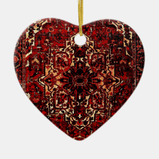 Oriental rug design in dark red ceramic ornament