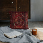 Oriental rug design in  dark red throw pillow