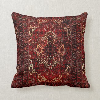 Oriental rug design in dark red throw pillow
