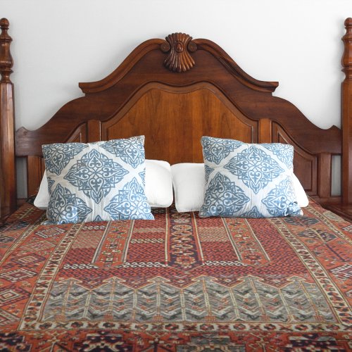 Oriental rug design in orange fleece blanket