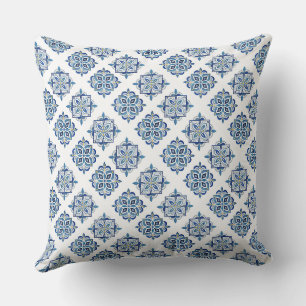Ornament embroidered blue on white throw pillow