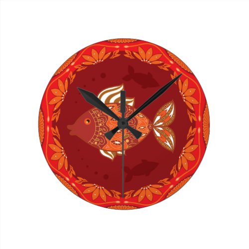 Ornamental fish on ethnic traditional flourish round clock