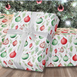Ornaments Pattern Christmas Wrapping Paper<br><div class="desc">Elevate your holiday gifts with this stylish wrapping paper featuring a striped pattern of elegant red and green Christmas ornaments on a white background, accented with evergreen greenery. This design adds a festive touch to your Christmas presents and is versatile enough for general winter occasions. The pattern beautifully captures the...</div>