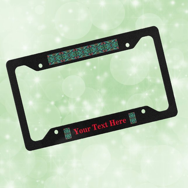 Ornate Celtic Knot Design Green Loops Red Dragons  License Plate Frame (Ornate Irish Celtic knot design in shades of green with red on black license plate frame.)