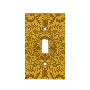 Ornate gold floral pattern with symmetrical light switch cover