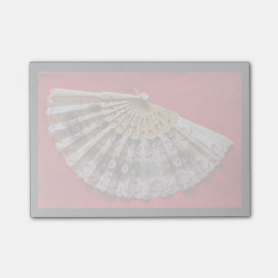Ornate Hand Held Fan on a Red Background Post-it Notes