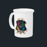 Ornate HOGWARTS™ House Crest Beverage Pitcher<br><div class="desc">HARRY POTTER™ | Check out this ornate HOGWARTS™ Crest with colorful silhouettes of the four houses!</div>