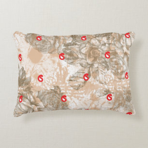Ornate textile design featuring floral patterns in accent pillow