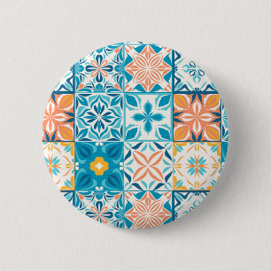 Ornate tiles in blue and orange button