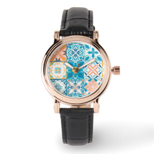 Ornate tiles in blue and orange watch