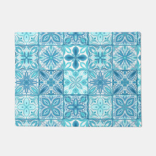 Ornate tiles in blue and white doormat