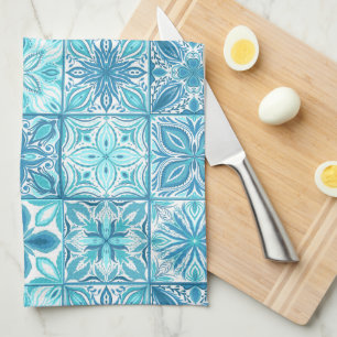 Ornate tiles in blue and white kitchen towel
