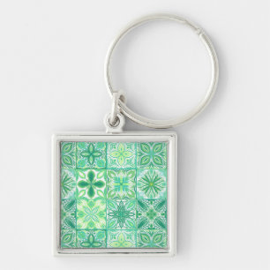 Ornate tiles in green and white keychain