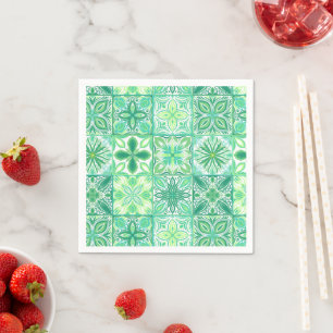 Ornate tiles in green and white napkins