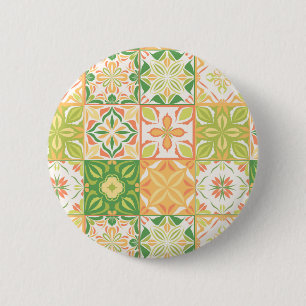 Ornate tiles in green and yellow button