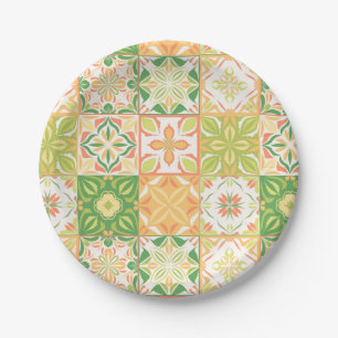 Ornate tiles in green and yellow paper plates