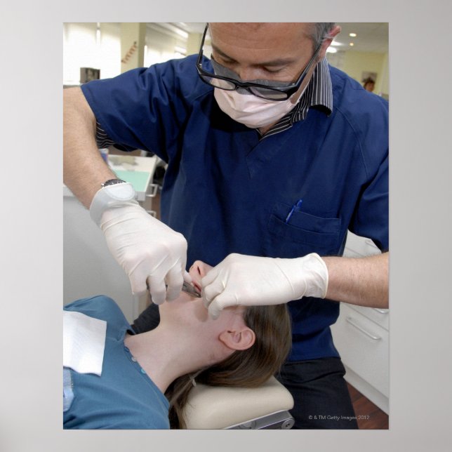 Orthodontist readjusting the dental braces of a poster (Front)