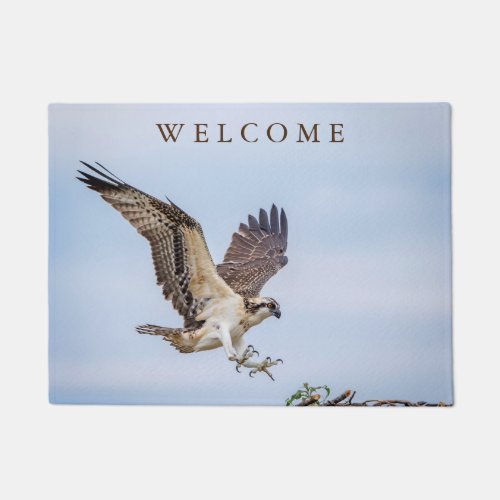 Osprey landing in the nest doormat