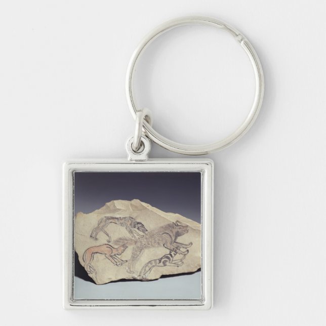 Ostracon depicting a dog chasing a hyena (limeston keychain (Front)