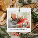 Our 1st Christmas as Grandparents Photo Keepsake Ceramic Ornament<br><div class="desc">Help them celebrate the arrival of their first grandchild with this modern minimalist photo keepsake ornament. The text reads "Our first Christmas as grandparents, " merry and bright and the year. simply upload an image with your favorite photo and it makes the perfect little keepsake gift this holiday season.</div>
