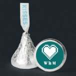 Our 8-Bit Hearts in Teal Hershey®'s Kisses®<br><div class="desc">Give your guests a tasty treat to take home at your geeky wedding or special event with these Hershey’s candies, featuring a white pixelated heart above a sample set of initials on a rich teal background on the bottom of the wrapper. Customize the initials to create a video game-themed personalized...</div>