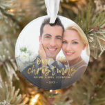 Our First Christmas 2 Photo Wedding Ornament<br><div class="desc">A true keepsake for the newlyweds features a modern script and modern typography in gold. Add your favorite photo. Makes a great gift for yourself or someone special.</div>