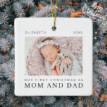 Our First Christmas as Mom and Dad Modern Chic Ceramic Ornament<br><div class="desc">Design is composed of modern chic typography with sans serif and serif font. Add a custom photo of baby and year.</div>
