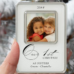 Our First Christmas Calligraphy Photo and Names Christmas Ornament<br><div class="desc">Our First Christmas photo ornament which you can personalize with your favorite photo and personalized wording. Elegant typographic design with swirly calligraphy and easy to customize for your occasion .. as a family of 3, as sisters, as brother and sister etc .. with names and year. The photo template displays...</div>